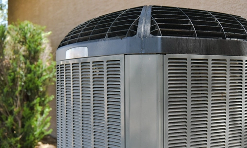 HVAC technician installing an air conditioning unit in Vancouver WA